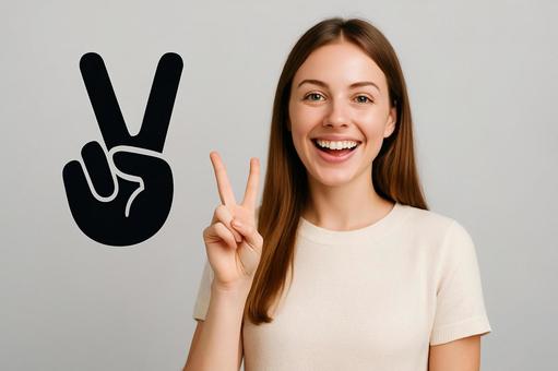 ピースアイコンとピースする女性 ピースアイコンとピースする女性の写真