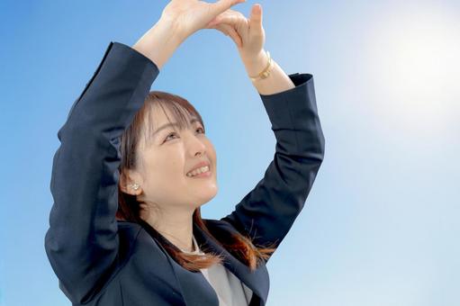 伸びするビジネスウーマン 女性,スーツ,ビジネスの写真素材