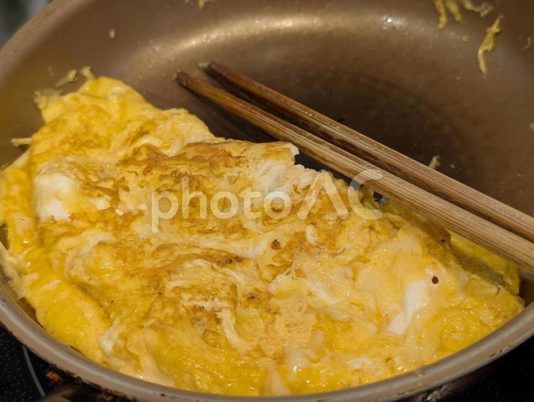 たまごを焼く 卵,たまごを焼く,焼くの写真素材