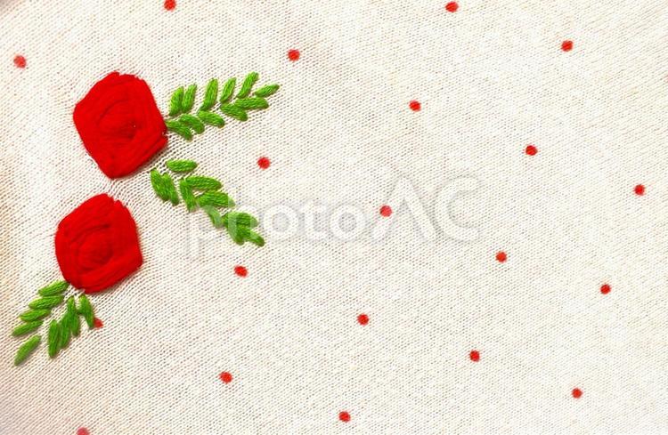 赤い花の刺繍のあるニット生地 刺繍,花,赤い花の写真素材