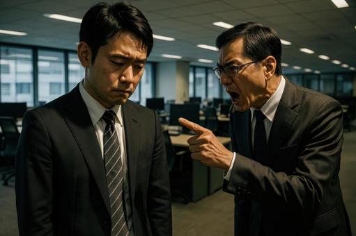 パワハラに耐えるサラリーマン パワハラに耐えるサラリーマンの写真