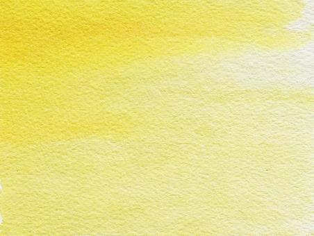 柔らかな黄色の水彩テクスチャの写真
