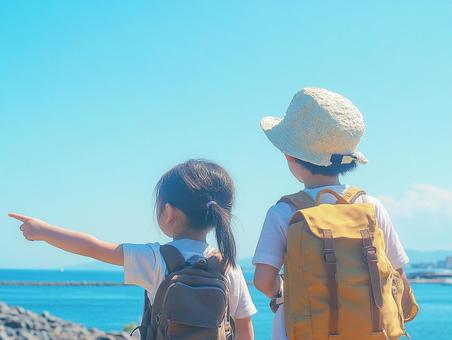 空を指さす子供 空を指さす子供の写真