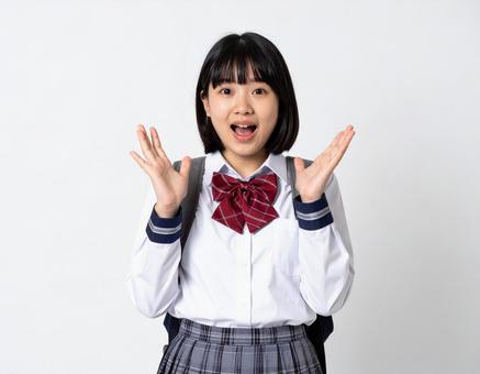 驚いた表情の女子生徒のイメージ 驚いた表情の女子生徒のイメージの写真