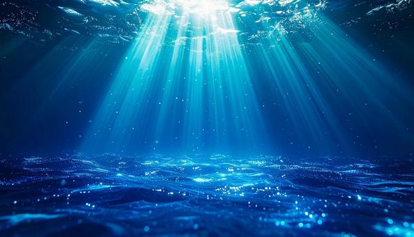 青い光に照らされた幻想的な海中 青い光に照らされた幻想的な海中の写真
