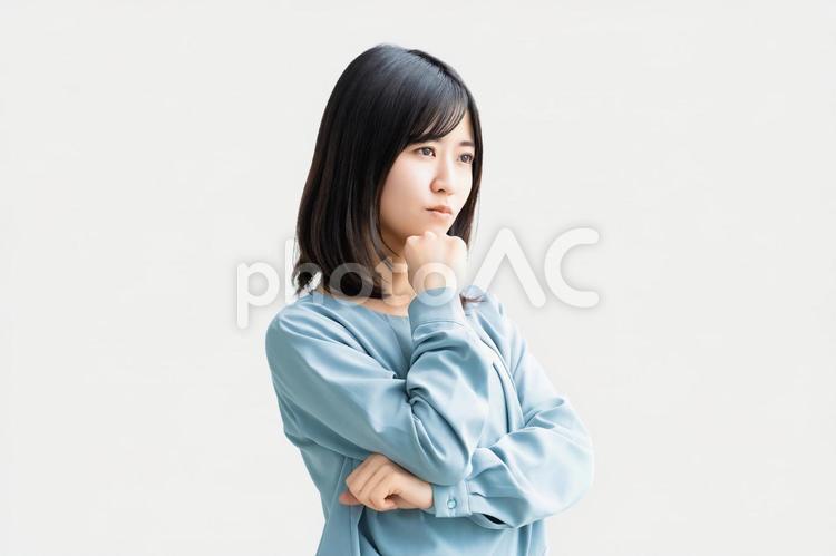考えごとをする女性・ビジネスウーマン 女性,ビジネス,考えるの写真素材