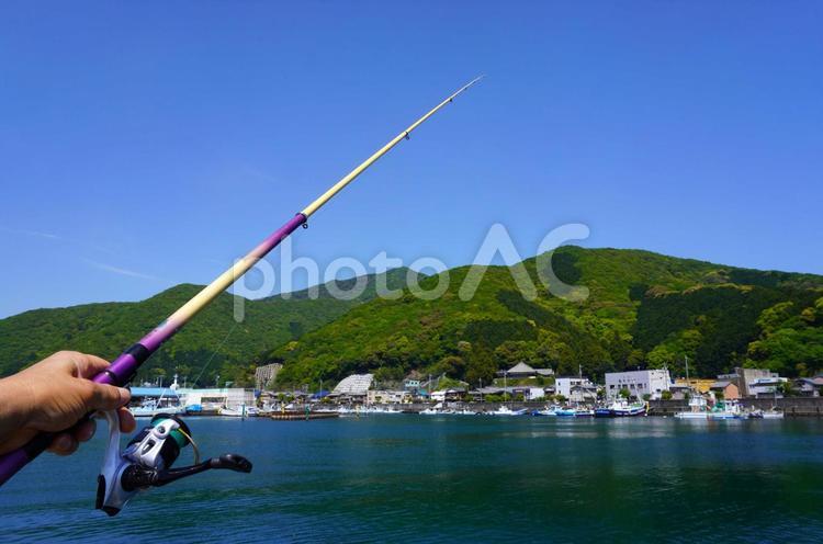 漁港で釣り竿を出す・三重県 魚釣り,釣り竿,漁港の写真素材