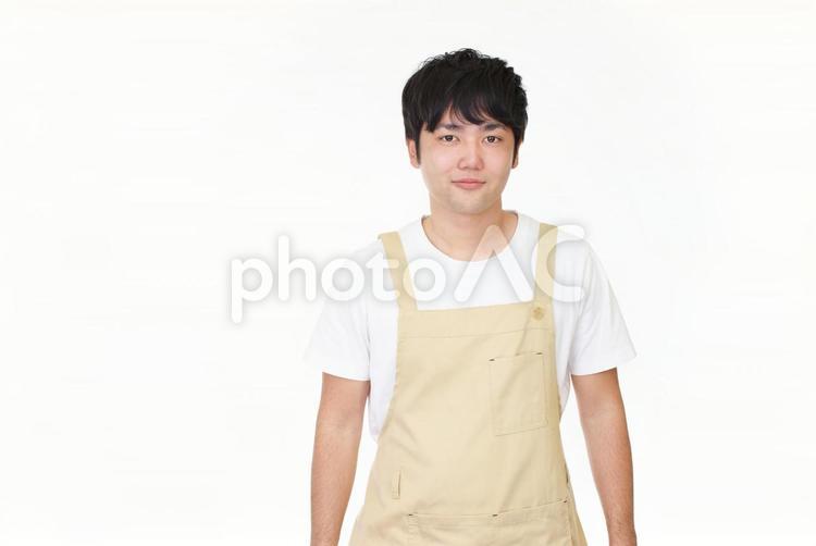 エプロンを着た男性 男性,男,ウェイターの写真素材