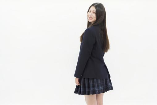 女子高生 受験生 振り向く 振り返る 女子高生 受験生 振り向く 振り返る 中学生,笑顔,振り向くの写真素材