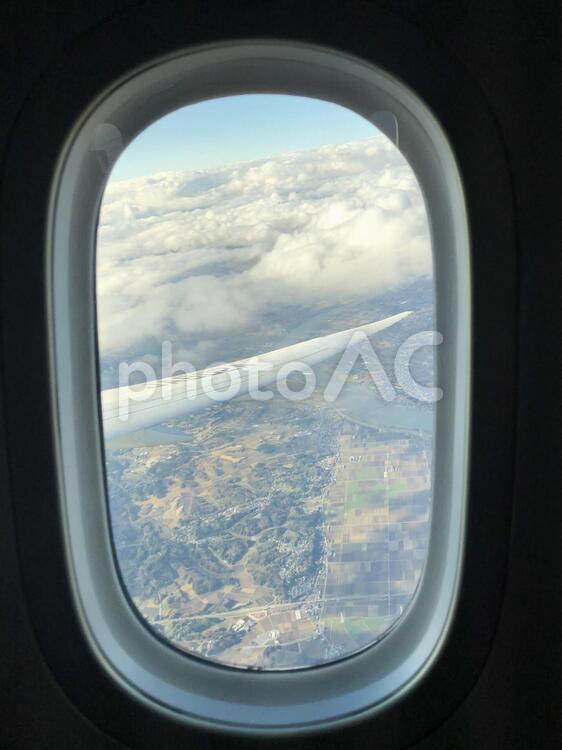 窓の外の世界 窓,飛行機,空気の写真素材