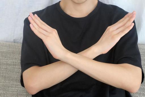 バツポーズの男性 バツポーズの男性 バツ,バツポーズ,男性の写真素材