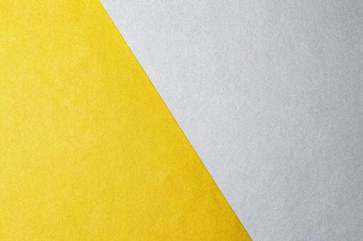 斜めの境界が印象的な金銀背景素材 金色,銀色,紙の写真素材