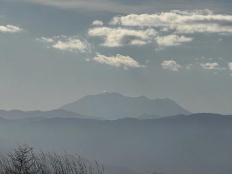 高ボッチ山から見た秋の御嶽山 御嶽山,空,雲の写真素材