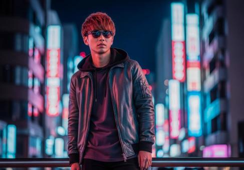 都会の夜、クールなデニムジャケットの男性 都会の夜、クールなデニムジャケットの男性の写真