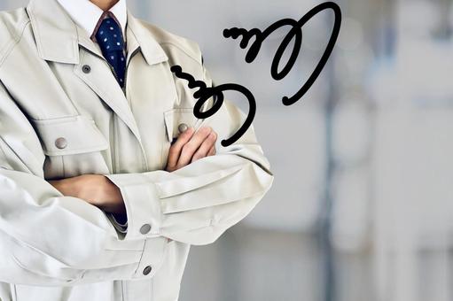 困ってモヤモヤしている男性作業員 スタッフ,作業員,悩むの写真素材