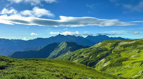 丸山_槍ヶ岳を望む 丸山_槍ヶ岳を望む 山の景色,天空,絶景の写真素材