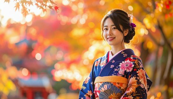 紅葉を眺める晴れ着姿の女性のポートレートの写真