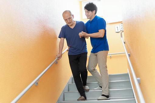 Elderly people going down the stairs with assistance, stage, senior citizens, assistance, JPG