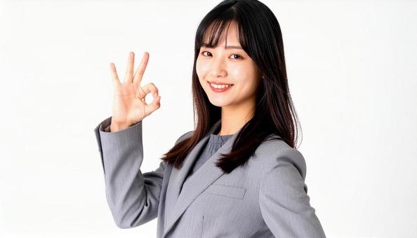 OKサインをする女性 OKサインをする女性の写真