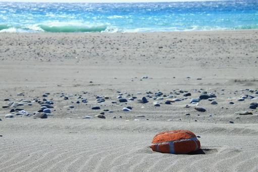 Round brick block on the beach, JPG