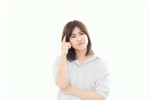 若い女性 ネガティブイメージ 頭痛 若い女性 ネガティブイメージ 頭痛の写真