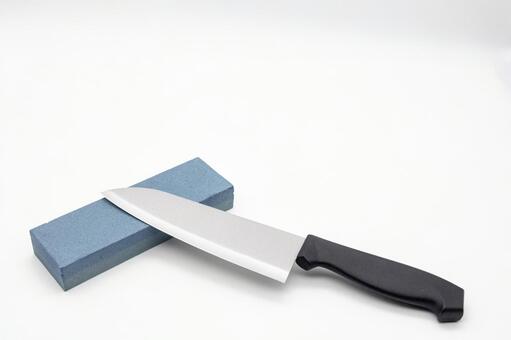 白背景に置かれた包丁と砥石 包丁,砥石,研ぎの写真素材