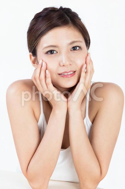 小顔　フェイシャルエステ 女性,女,ビューティーの写真素材