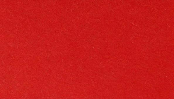 質感のある赤の和紙素材の写真