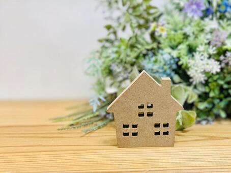 茶色い家の模型と植物背景 家,不動産,住まいの写真素材