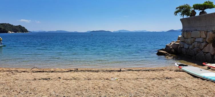 夏の砂浜 海辺,遠浅の海,夏の海の写真素材