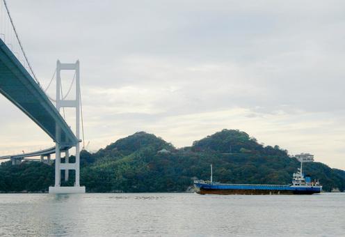 瀬戸内を渡る橋と船 今治市,しまなみ海道,馬島の写真素材