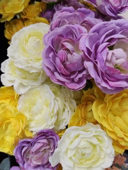 カラフルな薔薇の造花 カラフルな薔薇の造花の写真