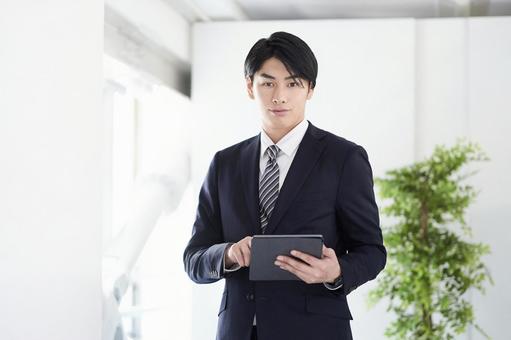 Japanese male businessman looking at the camera with a serious expression, عمل, رجل, رجل أعمال, JPG