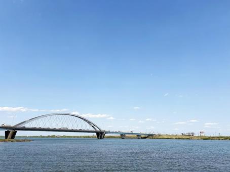 Overpass, blue sky and river, JPG Overpass, blue sky and river, JPG