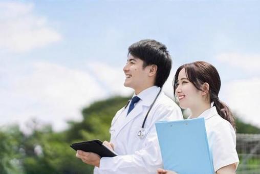 Doctors and nurses standing with a smile on a blue sky background, a doctor, nurse, blue sky, JPG