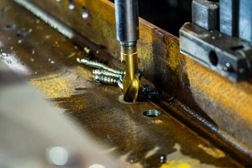 ドリル 穴あけ 金属加工 建築鉄骨,鉄工所,金属加工の写真素材