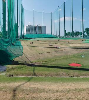 ゴルフ・早朝の打ちっ放しゴルフレンジ ゴルフ,golf,打ちっ放しの写真素材