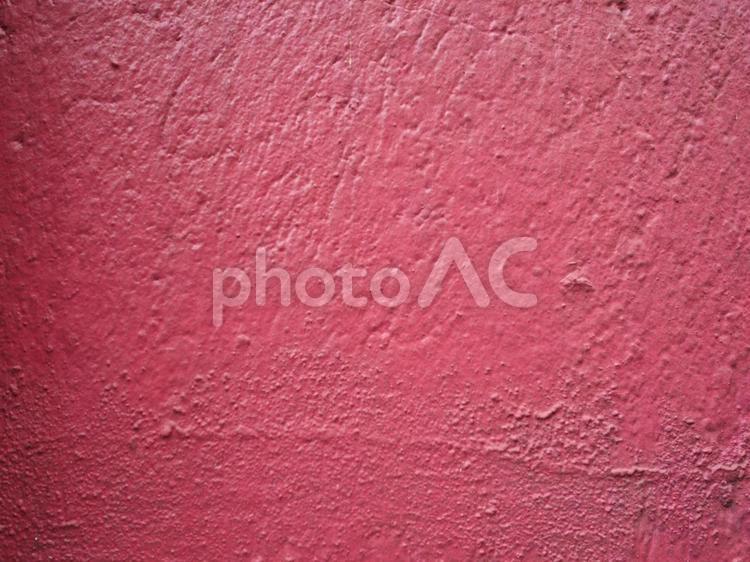 テクスチャ：ピンクに塗られた壁背景 ピンク,派手,壁の写真素材