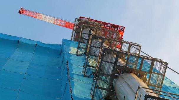 マンション工事現場 タワークレーン マンション工事現場 タワークレーン マンション工事,工事現場,タワークレーンの写真素材
