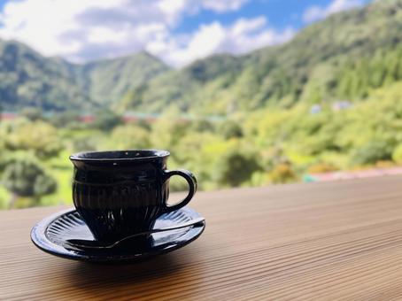 Mountain coffee cup blue sky, JPG