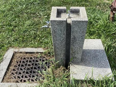 公園の水飲み場 公園の水飲み場の写真