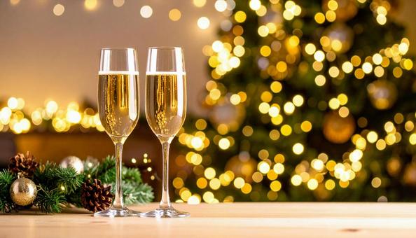 シャンパンでクリスマスを祝う シャンパンでクリスマスを祝うの写真