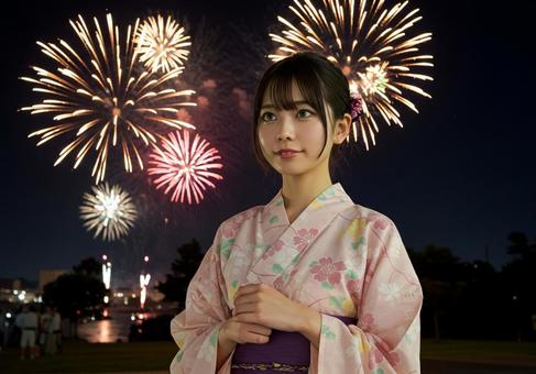 花火を見る浴衣の女性 花火を見る浴衣の女性の写真