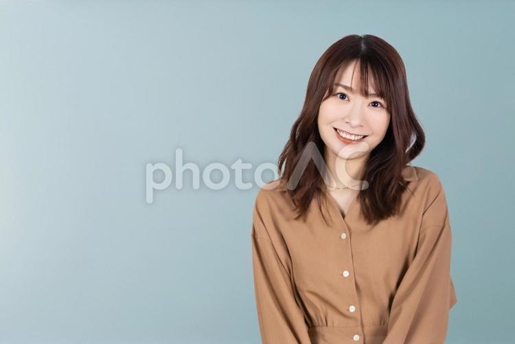 笑顔のビジネスウーマン（グリーン） 女性,ビジネス,人物の写真素材