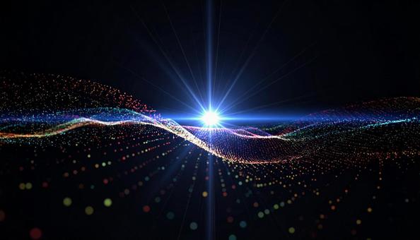 光の波とカラフルな粒子の幻想の写真