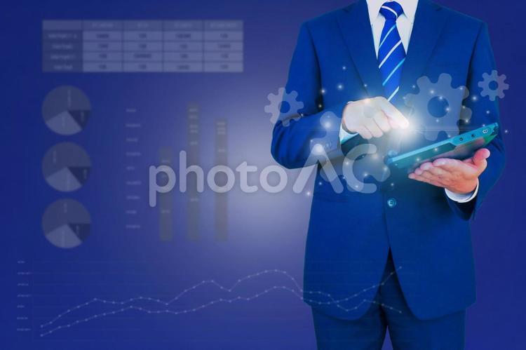グラフデータとビジネスマンのイメージ グラフ,数字,利益の写真素材