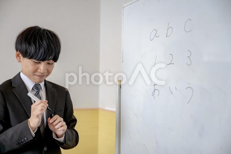 ペンとホワイトボードと男性 教育,ビジネスマン,授業の写真素材