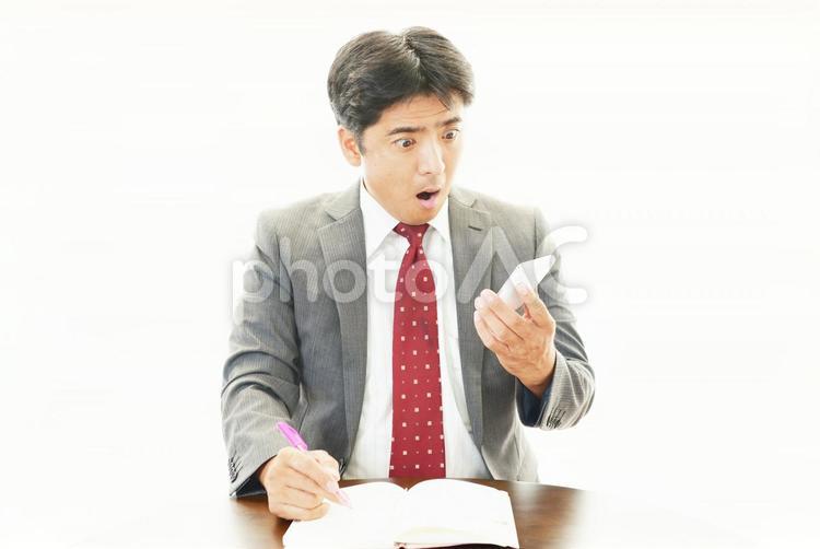 驚いた表情のビジネスマン 男性,人物,ビジネスマンの写真素材