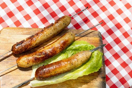 焼き目のついた串焼きのソーセージ ソーセージ,焼き目,焦げ目の写真素材