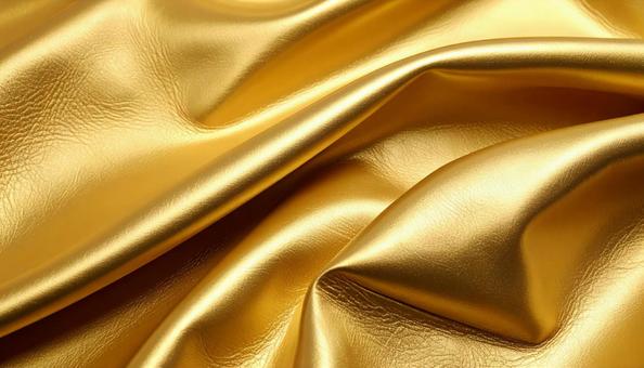 金色のリアルな質感のレザーの背景の写真